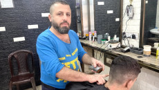 A barber shop turns into meeting point for Alqush residents