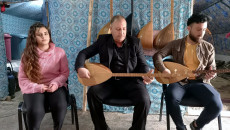 A family music band in an IDP camp