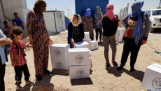Göçmenler Bağdat’tan gönderilen gıda paketine tepki gösterdi