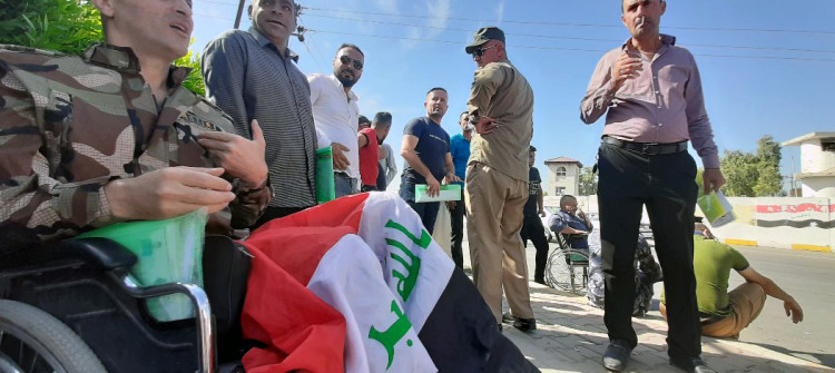 Retired police personnel stage demonstration in Kirkuk