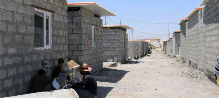 IDPs lost tents in camp fire feel safer in concrete homes