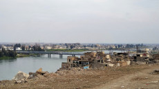 Woman jumps off Mosul’s Old Bridge in apparent suicide