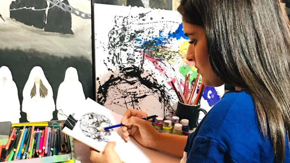 Displaced Ezidi girl paints her feelings and imaginations during coronavirus lockdown