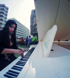 Rana Jassim teaches piano to Kids with Down syndrome