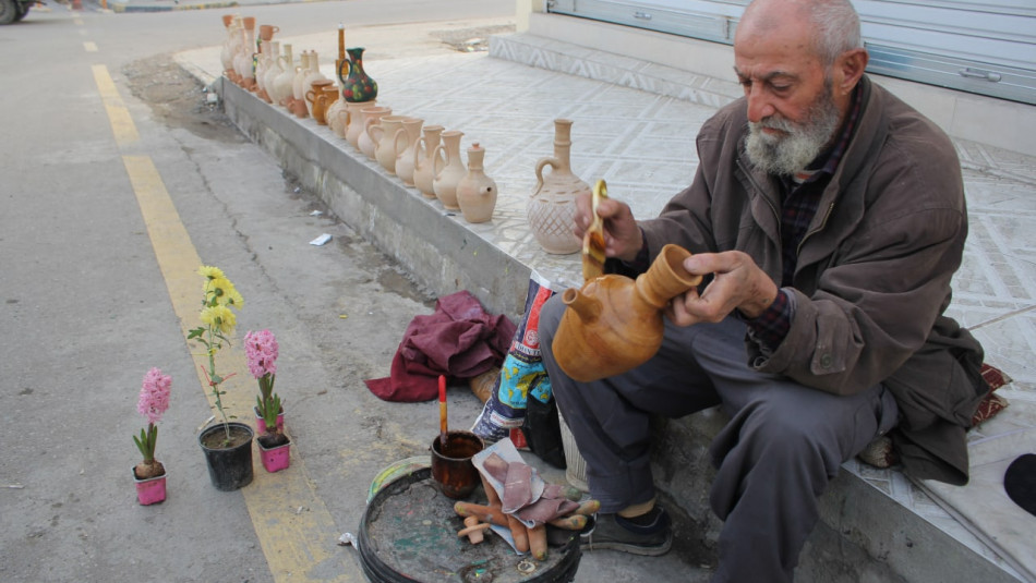 ISIS war turned Abu Omar from technician to potter