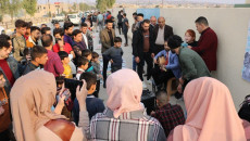 Tal Afar book sidewalk: attempt to erase destruction