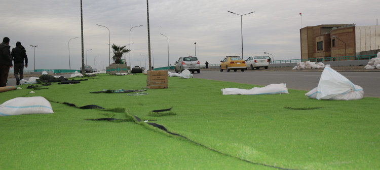 Artificial grass again installed on sidewalks of Kirkuk