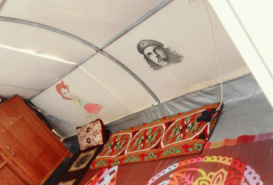 I initially cleaned the tents and later painted several pictures including a picture of Che Guevara