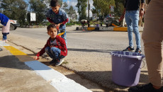 Telafer'in çocukları ve kadınları şehirlerini süslüyor ve sosyal uyum mesajını gönderiyorlar