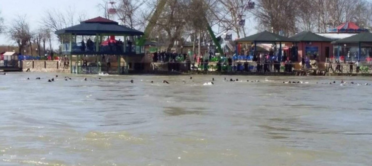 An overloaded ferry capsizes in Tigris River near Mosul leaving dozens dead